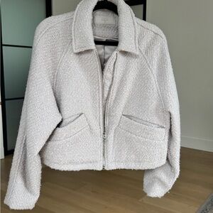Cropped Blank NYC jacket in light gray with chrome zippers